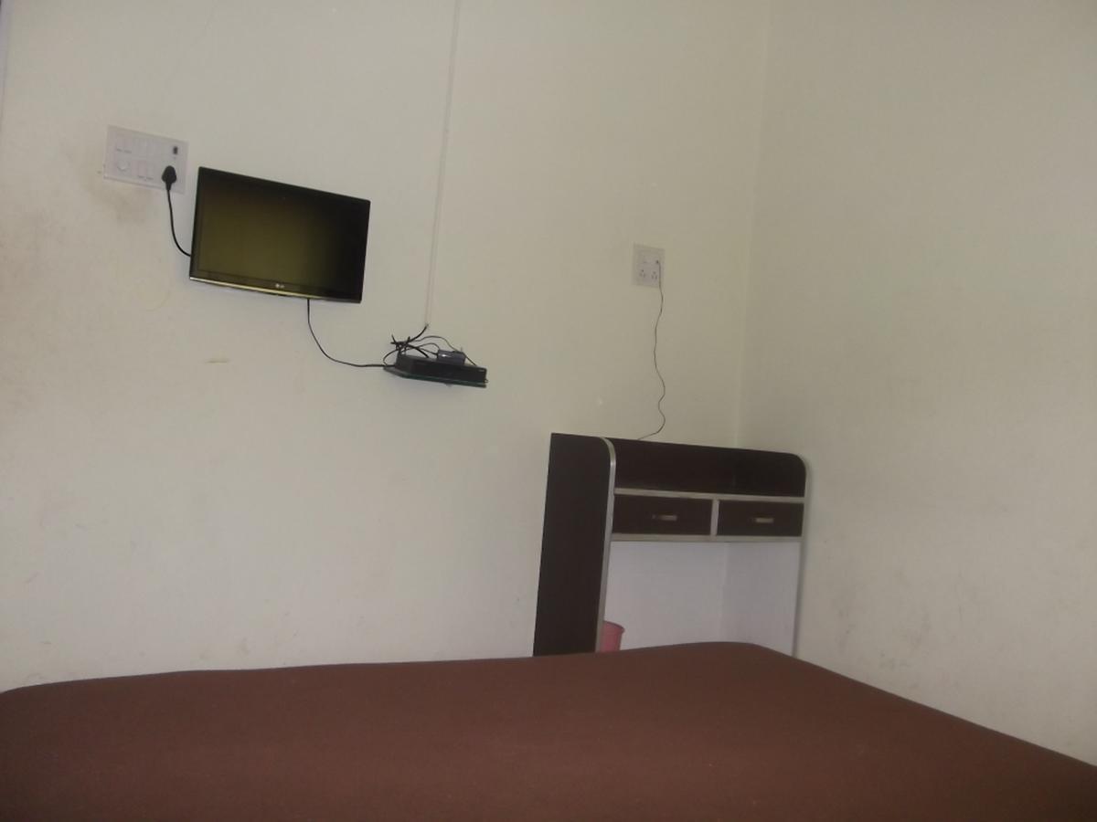 Hotel Rajyog Ranjangaon Ganpati Szoba fotó